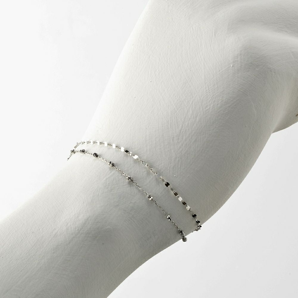 18K WG 106589-W AJ 7"