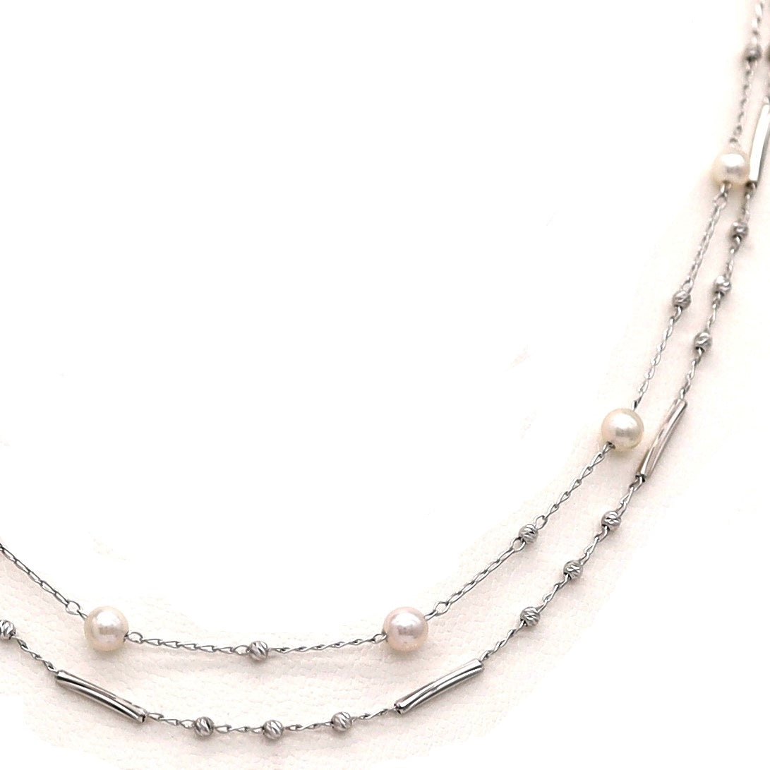 18K WG EVENT-11W PEARL MV 18"