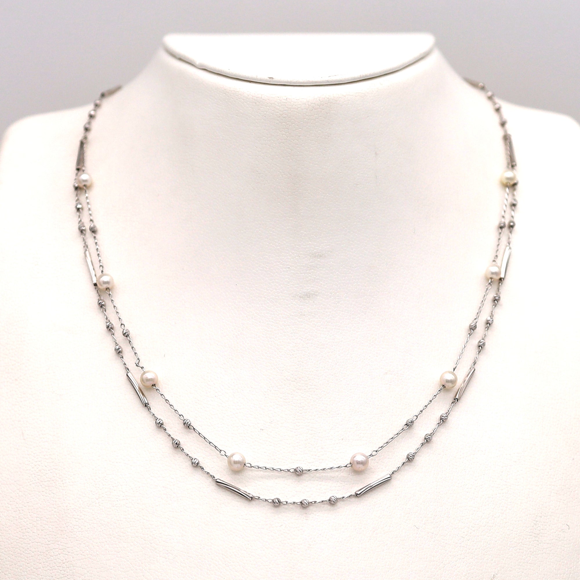 18K WG EVENT-11W PEARL MV 18"